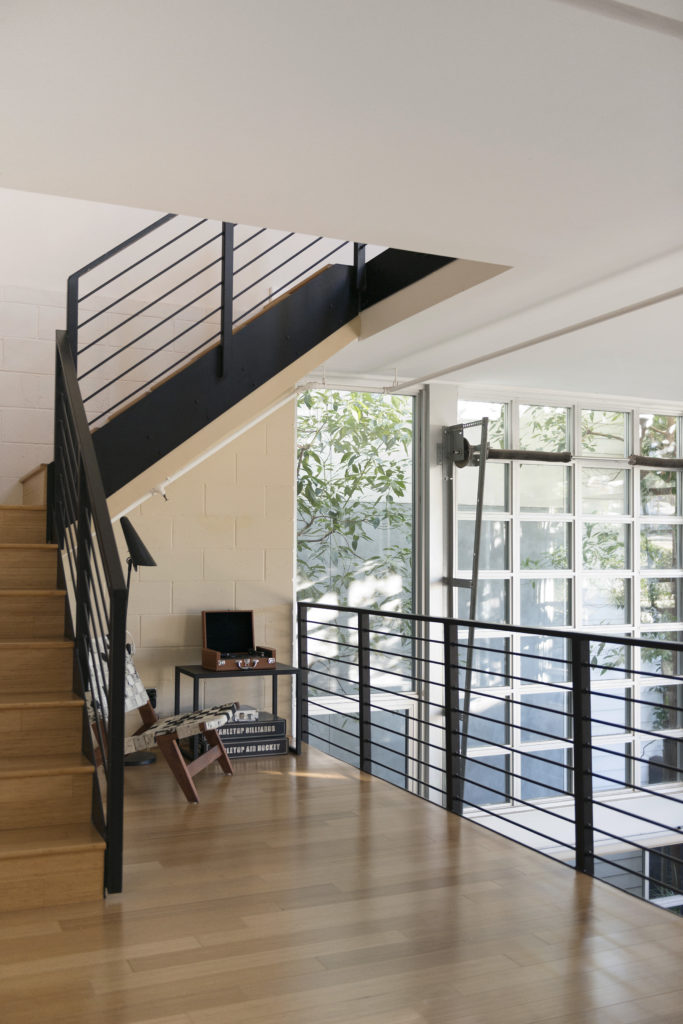 Four Point Design Build - AUTO GARAGE TURNED LUXURY LOFT