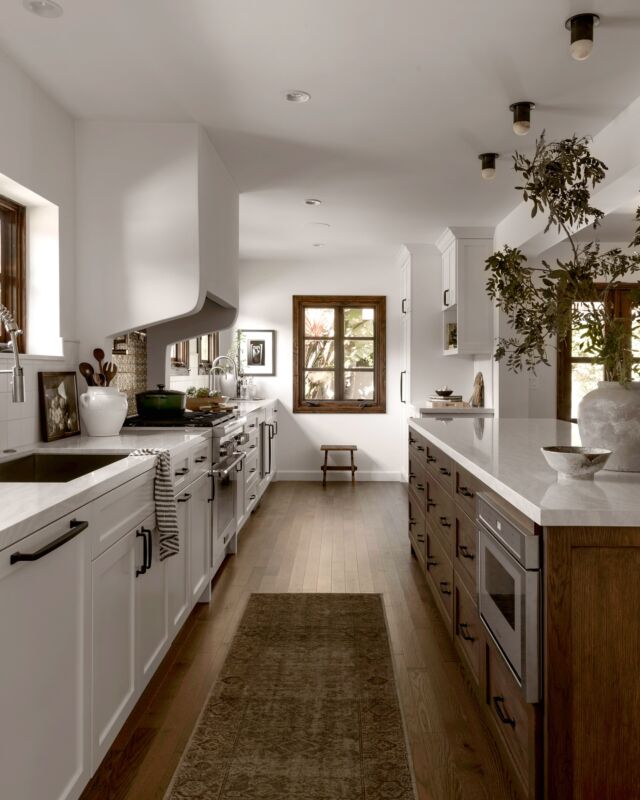 A Well-Organized Kitchen - A Well-Organized Life!

There’s truly nothing like a kitchen designed to support your daily rhythm – from meal prep to easy clean up and everything in between. When it comes to creating a functional, efficient, and beautiful space, every detail counts.

A few key elements we love to incorporate: 

▫️Solid Surface Countertops: Not only stunning, but durable and easy to clean – the perfect foundation for any task. 

▫️Personalized Cabinet Storage: Custom solutions for all your kitchen essentials, keeping everything you need within reach, neat, and organized. 

▫️Lighting Layers: We layer task, ambient, and decorative lighting to illuminate every corner – creating a space that’s practical, adjustable, and beautiful. 

▫️Visual Access to the Outdoors: Bringing in natural light and outdoor views whenever possible – it’s a mood booster and enhances well-being. 

▫️Kitchen Movement Flow: Thoughtful design creates an intuitive, easy flow for cooking, cleaning, and enjoying meals.

When all these elements come together, meal prep becomes a breeze, snacks are at the ready, and clean-up? Effortless. The materials you choose don’t just enhance your kitchen’s aesthetic – they play a vital KEY role in your daily productivity, health, and overall well-being.

Here’s to kitchens that nourish us in every way! 

Interior Architecture and Design-Build @4ptdesignbuild
Photography @Public311Design

#KitchenGoals #OrganizedLiving #HealthyLiving #KitchenDesign #WellnessDesign #HomeInspiration #MealPrepMadeEasy #InteriorDesign #Wellness #CleanFreshModern #interiorsforrealliving #losangelesinteriordesigner